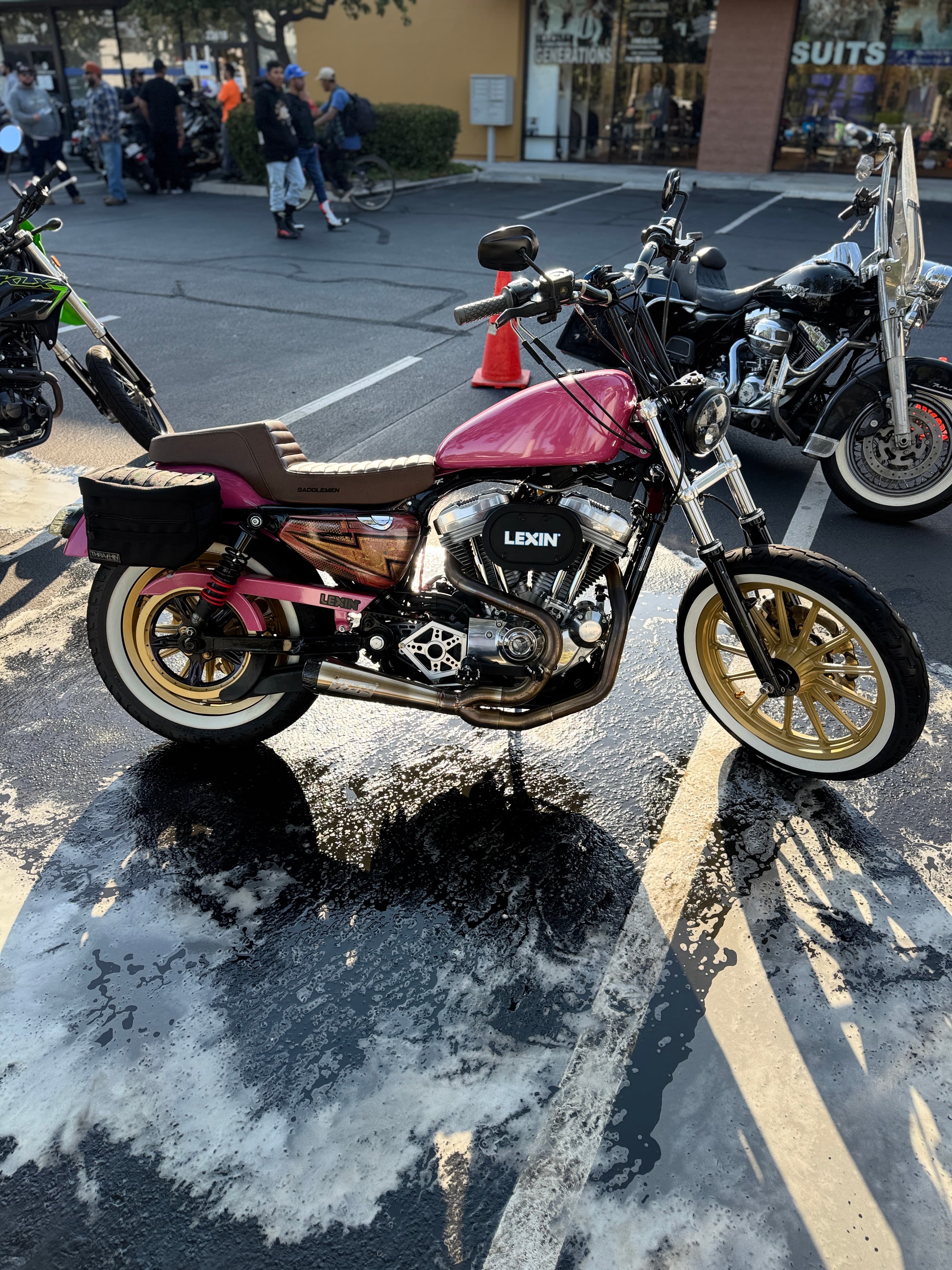 Custom Harley Sportster with gold wheels